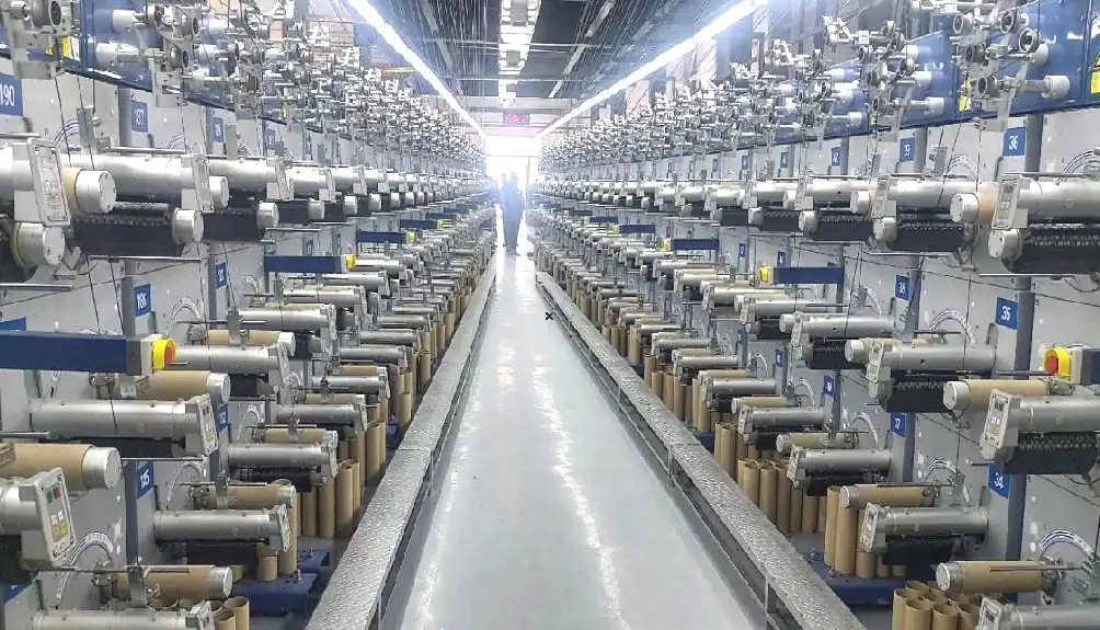 Professional carbon fiber precision cross-winding machine on a production floor